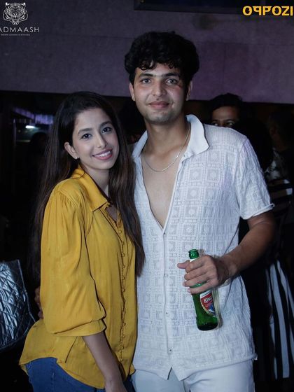 Another cool couple posing for a photo at Badmaash.