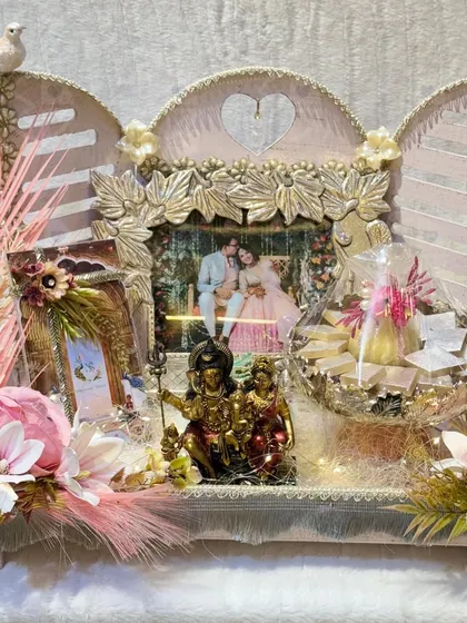 A wedding hamper is more than a gift. It's a gesture of love, beautifully curated with a personalized photo frame, sweets, and blessings. This arrangement was designed for a family to welcome their new member with warmth and elegance.