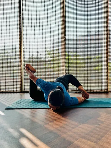 This lying down twist is a fantastic way to release the spine and open the shoulders. Even in complex poses, the goal is to find a sense of ease and breath.