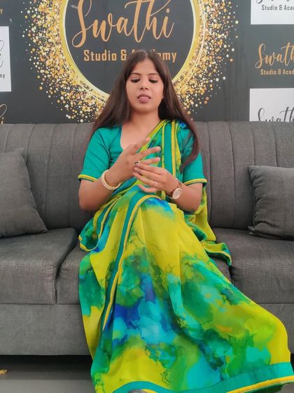 Explaining a concept during a workshop. My saree allows me to move freely and express myself.