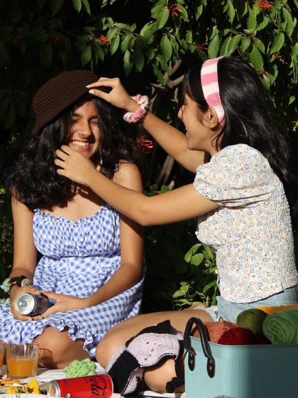 Crochet is all about having fun. Here’s a playful moment from a picnic where I’m sharing my handmade creations.