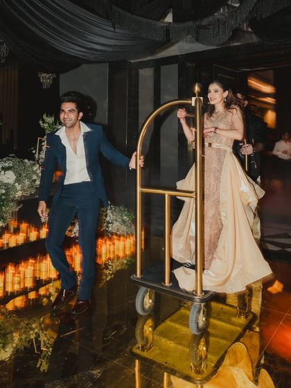 Sometimes the most memorable moments are completely unplanned, like the bride making an entrance on a hotel luggage cart. We encourage and embrace the spontaneous fun.