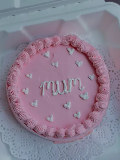 Sometimes the sweetest celebrations are the smallest. Our adorable pink bento cake with "mum" written in delicate script is the perfect way to show your love, whether it's for Mother's Day or just because.