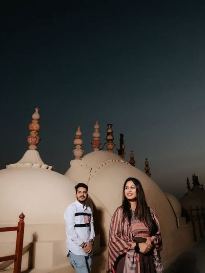 A beautiful twilight shot on a rooftop, with the last light of day creating a moody and romantic atmosphere.