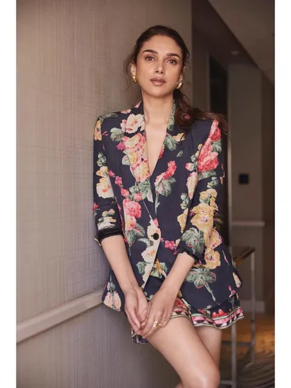 Another shot of the Ranna Gill floral suit, a versatile rental that can be dressed up or down.