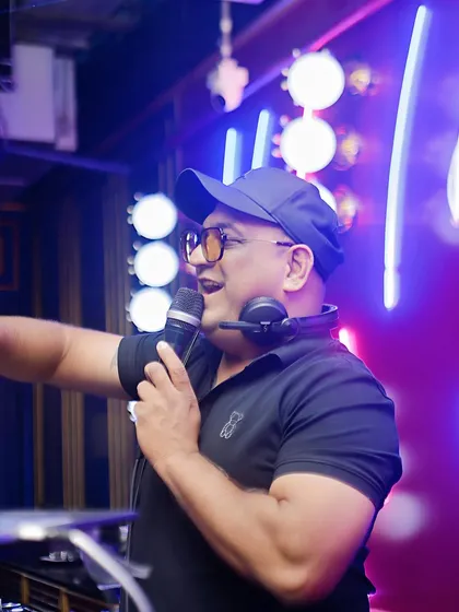 A huge part of my performance is connecting directly with the audience. I don't just play tracks; I get on the mic to hype the crowd, guide the energy, and make sure everyone feels like part of the show. This is how we build a vibe together.
