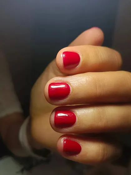 You can never go wrong with a classic red. This is a perfect, chip-free gel manicure on short, natural nails. I focus on meticulous application for a flawless, high-gloss finish that lasts.