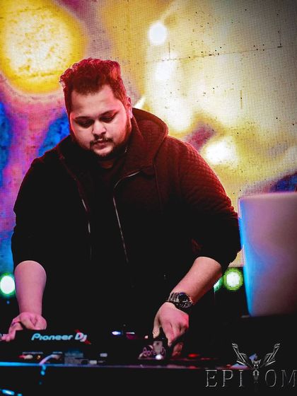 Don't lose yourself for the sake of trying to fit in. A focused, moody shot of me at the decks.