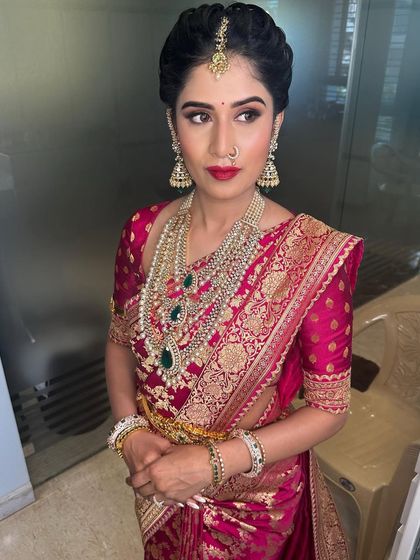 A full view of this regal look. The makeup is strong yet elegant, designed to make a statement while feeling timeless.