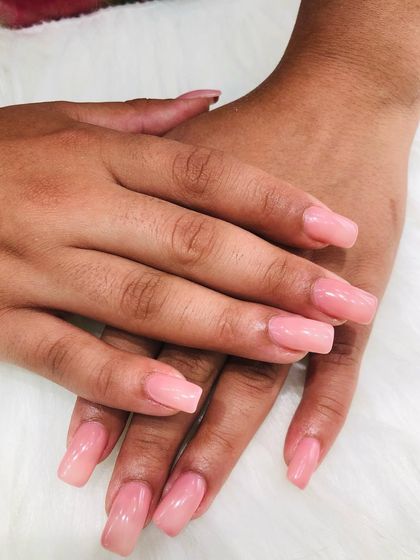 Another view of the clean and simple nude pink extensions.