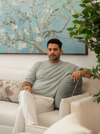 A portrait of me in front of a beautiful piece of art. I believe that a home should be a collection of things you love, and art plays a huge role in that.