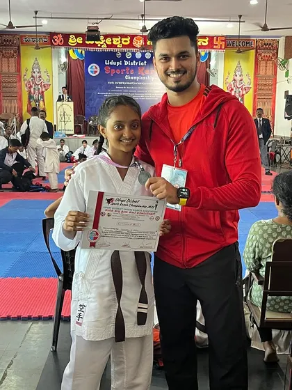 Another one of my dedicated students with her silver medal, ready for the next challenge.