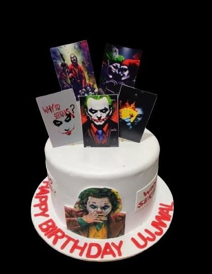 A Joker-themed cake for a fan of the iconic character. The cake is decorated with various images of the Joker, capturing his chaotic and mysterious vibe.