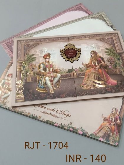 A gate-fold invitation that opens to reveal a royal couple seated on thrones. The pastel colors and intricate artwork make it a sophisticated choice for your wedding announcement.