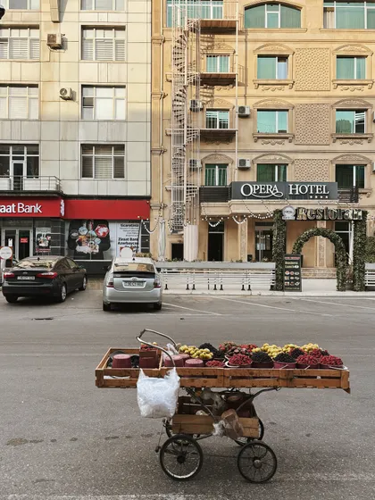 A simple fruit cart against the backdrop of Baku's architecture. I love capturing these everyday street scenes that tell a story of a place.