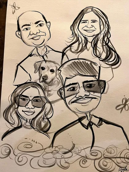 A full family portrait that includes the family dog right in the middle of the group.