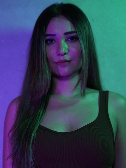 A portrait with some cool lighting. Capturing the mood for the summer season of open-air gigs.