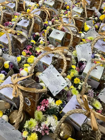 A sea of housewarming return favors I prepared for a client. Each mini-basket was filled with love, flowers, and a little something sweet to thank their guests.
