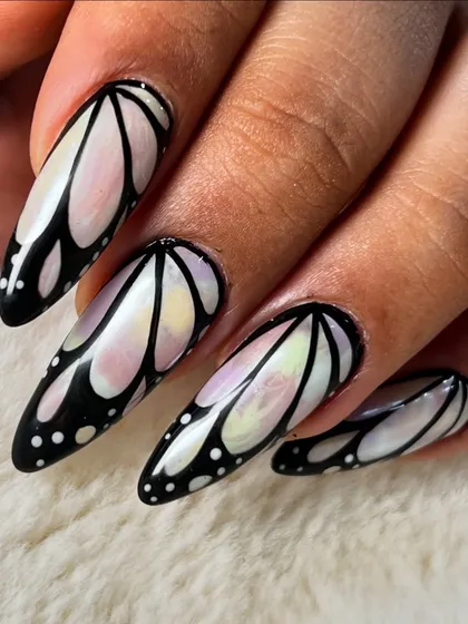 This iridescent butterfly wing design is a perfect example of the trendy, advanced nail art techniques you can master at my academy. We focus on creating clean lines and stunning visual effects that will make your portfolio stand out.