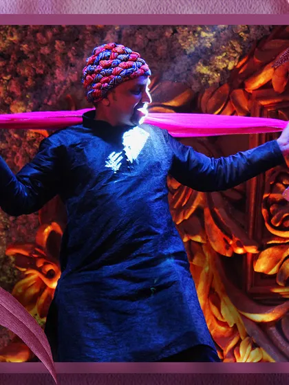 A performer owning the stage during a family sangeet. We help every family member find their inner dancer and deliver a performance they can be proud of.