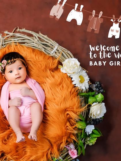 Welcome to the world. This little girl is wide awake in her cozy nest prop, giving us a wonderful, expressive portrait to announce her arrival.