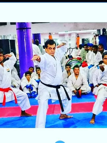 My guru, Hanshi Bharat Sharma Sir, leading a training session. His direct instruction in fundamental stances and techniques forms the core of our academy's success.