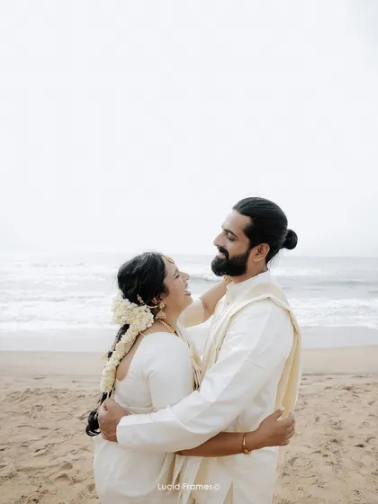 Sharing a look of love against the backdrop of the ocean. We specialize in destination wedding photography that feels both epic and intimate.