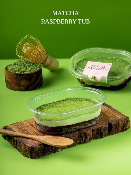 For an individual treat, we offer the Matcha Raspberry dessert in a convenient tub, perfect for enjoying on the go.