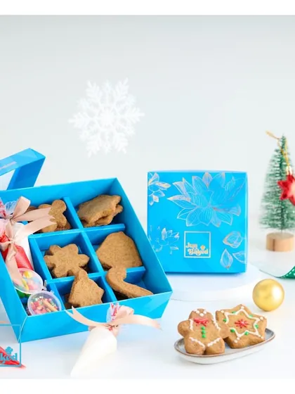 Another look at our DIY Gingerbread Cookie Decorating Kit. It comes with freshly baked cookies in festive shapes, ready for you to add your creative touch.