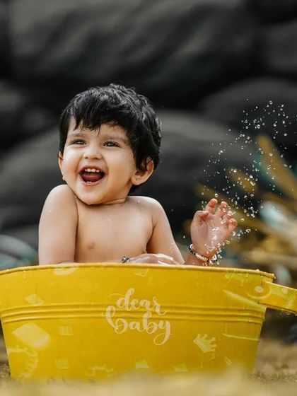 Happiness is a day spent outside. This joyful splash in a tub brings studio fun to the great outdoors.