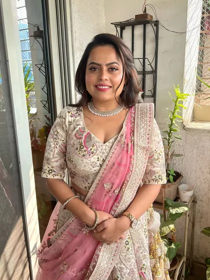 A beautiful dewy, soft glam look for a bride-to-be. The makeup is fresh and radiant, with a focus on glowing skin and soft pink tones on the lips and cheeks.