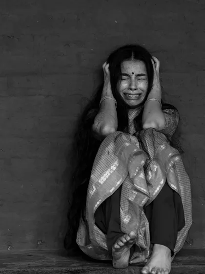 A duplicate shot that emphasizes the raw emotion of a moment of complete breakdown, where fear turns into overwhelming sorrow.