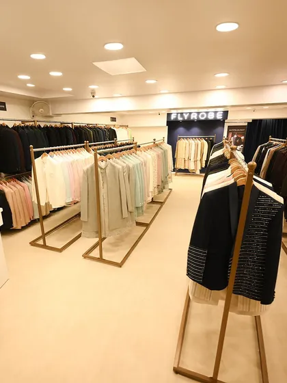 A wide-angle shot of our store layout, designed for an easy and comfortable browsing experience. Find your perfect outfit for the next wedding season here.