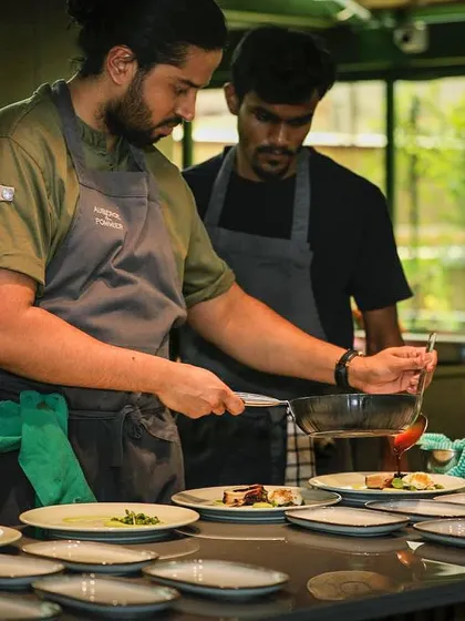Precision in every step. Here, my team and I are in the midst of service, ensuring each plate is executed flawlessly for a private event. This is the focus required for a true luxury dining service.