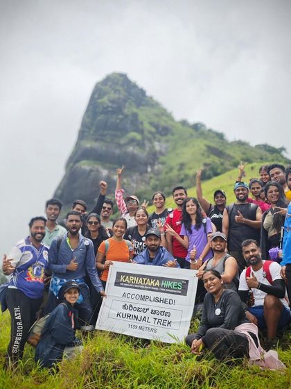 Another successful group at the summit of Kurinjal, celebrating their achievement.