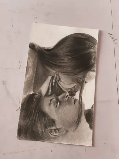 A romantic sketch inspired by a movie scene, capturing a tender moment between a couple. This was drawn on a smaller sheet, focusing on emotion.