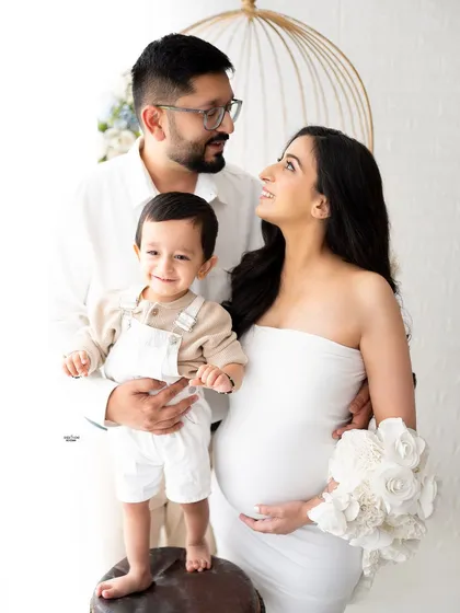 A beautiful family expecting a new addition. This photo captures the love and anticipation perfectly.