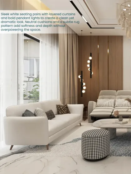 Sleek white seating pairs with layered curtains and bold pendant lights to create a clean yet dramatic look in this living space.