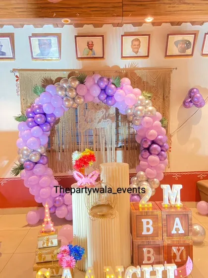 Another view of the 2-month celebration, showing how the decorations can transform a corner of a home into a special party space.