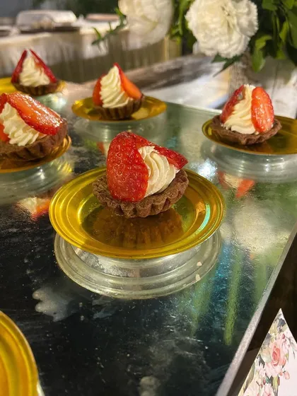 Classic strawberry and cream tarts. The simple combination of a buttery shell, fresh cream, and a juicy strawberry is a timeless dessert favourite.
