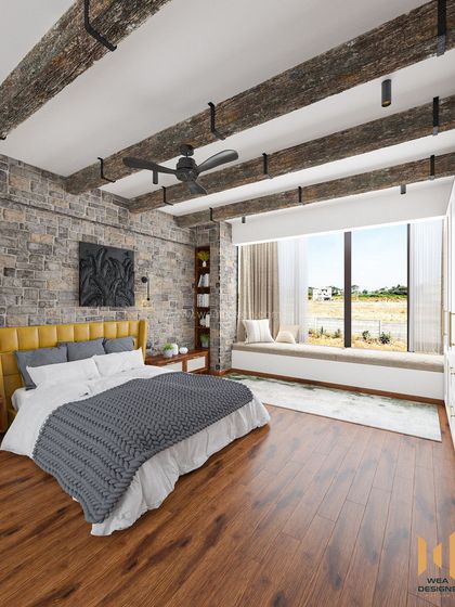 A modern rustic bedroom at Svamitva Terravana villa, featuring exposed old wooden logs on the ceiling and a natural stone cladding accent wall.