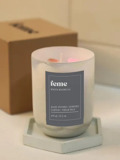 Our White Magnolia jar candle, complete with heart melts, resting on a hexagonal trinket tray. A perfect weekend mood.