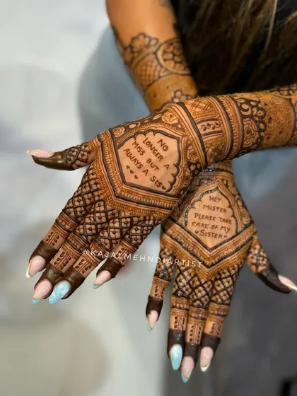 A different angle of the sister's special message henna.