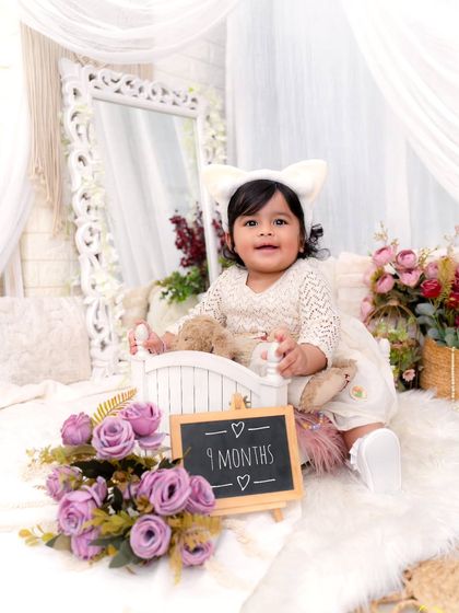The cutest little bunny in town. This nine-month milestone session with a cute chalkboard sign is a fun way to track their growth.