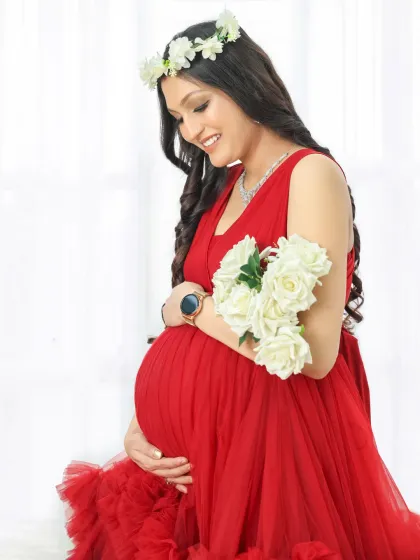 A collection of images showcasing the versatility of the red gown, featured in both solo and couple's shots with various props and poses.