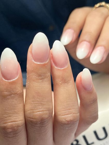 A close-up of the baby boomer gradient, showing the soft transition between the pink and white. This is a highly requested look that is always in style.