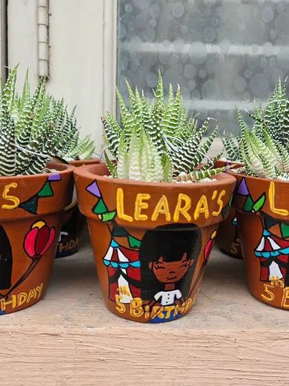 We love helping create meaningful gifts. These Zebra Haworthia succulents were potted in custom hand-painted pots by Art_atica as unique return gifts for Leara's 5th birthday party.