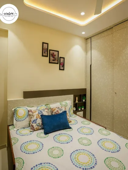 A view of the bed and sliding wardrobe in this guest bedroom.