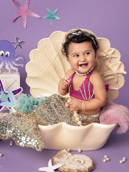 A close-up of our mermaid princess and her radiant smile. I make sure to capture a variety of shots, from wide scenes to tight portraits, to tell the full story.