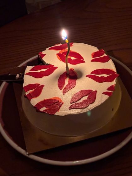 A customer celebrating their birthday with our kiss cake. Seeing our creations become part of your special moments is the best feeling.